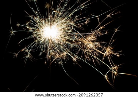 fireworks, sparks on a black background.