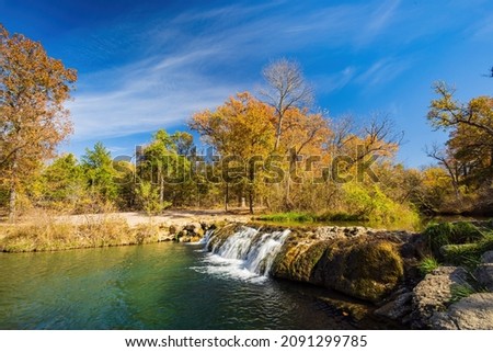 Sunny view of the Little Niagara Falls of Chickasaw National Recreation Area at Oklahoma Royalty-Free Stock Photo #2091299785