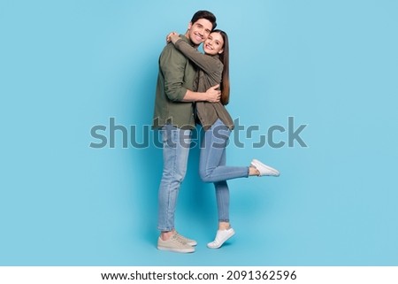 Full length photo of married couple lady cuddle guy soulmate isolated over sky light color background Royalty-Free Stock Photo #2091362596