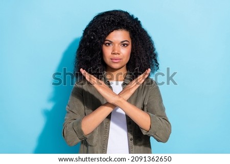 Photo of youth african lady crossed hands show no decline forbidden rule signal isolated over blue color background Royalty-Free Stock Photo #2091362650