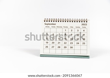 September 2022 paper calendar month page on white background Royalty-Free Stock Photo #2091366067