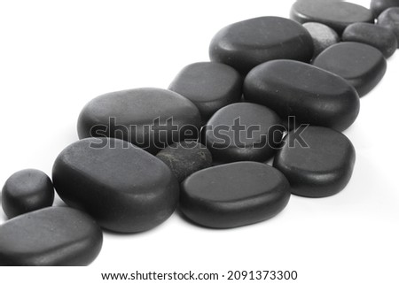 black spa stones isolated on white background - Image 