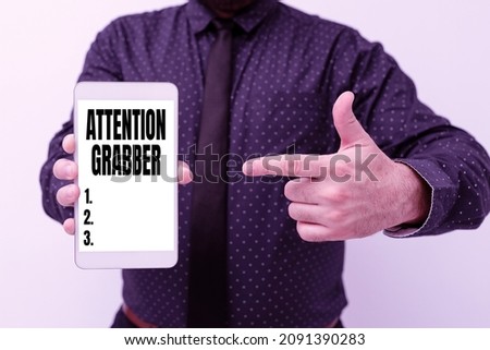 Text caption presenting Attention Grabber. Conceptual photo Demanding notice mainly by being prominent or outlandish Presenting New Technology Ideas Discussing Technological Improvement