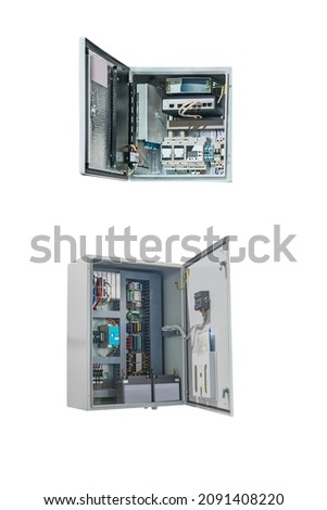 two electrical control cabinets for various purposes with an open door isolated on white background Royalty-Free Stock Photo #2091408220