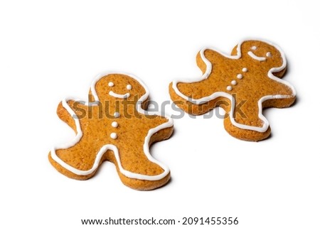 Christmas homemade gingerbread cookies, gingerbread man on the white background
