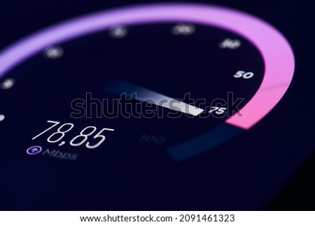 Checking internet speed. Results of internet speed test. Mobile phone screen with accelerometer with high values of internet speed Royalty-Free Stock Photo #2091461323