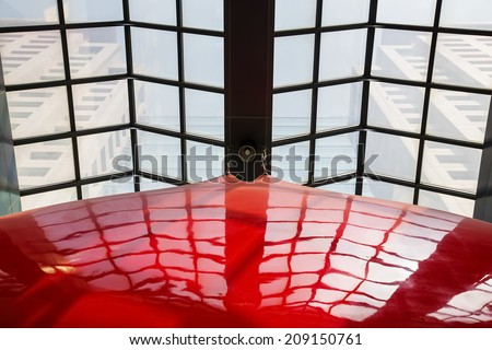 the red panel reflect roof windows shadow