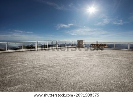 Empty floor ground on rooftop with beautiful sunlight blue sky. Royalty-Free Stock Photo #2091508375
