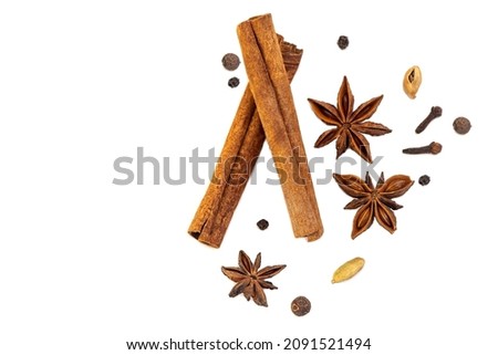 spice isolate. a set of spices for mulled wine. anise, cinnamon and cloves on a white table. spices for making a winter drink on a white background Royalty-Free Stock Photo #2091521494