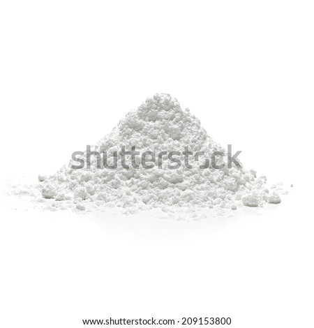 Icing, powder, confectioners or caster sugar pile side view isolated on white background