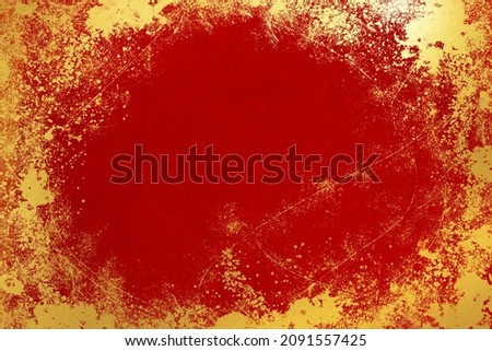 Red washi paper with gold splashes on a Japanese background.
