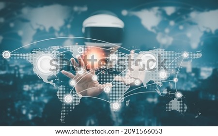 Man wearing VR glasses virtual touch map navigating the virtual world ,Business analytics and financial concept, Plans to increase business growth and increase ,Technology and Business trend analysis.