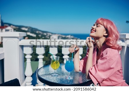 glamorous woman restaurant terrace landscape rest sunny day
