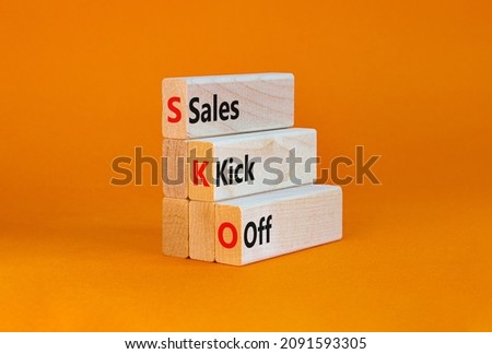 SKO sails kick off symbol. Concept words SKO sails kick off on wooden blocks. Beautiful orange table, orange background, copy space. Business and SKO sails kick off concept. Royalty-Free Stock Photo #2091593305