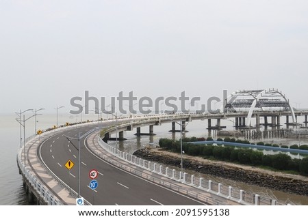 The Suroboyo Bridge with sea