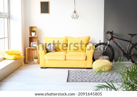 Bicycle in interior of stylish living room