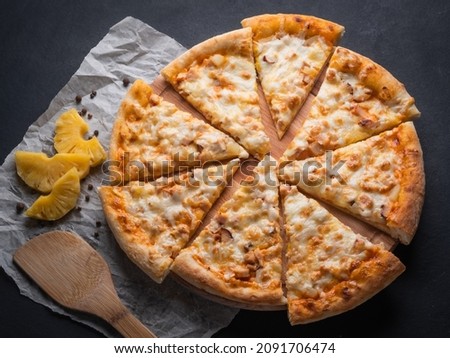 Appetizing pizza, cut into pieces. Italian food, natural ingredients