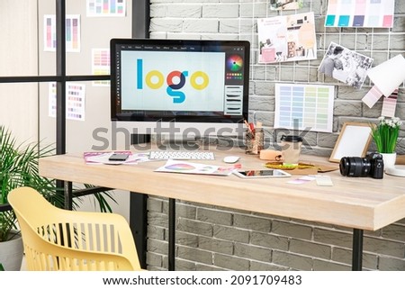 Comfortable workplace of graphic designer in office Royalty-Free Stock Photo #2091709483
