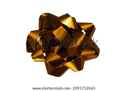 
Gold bow isolated on white background. Ribbon bow for a decorated gift. Ribbons isolated on white background. This is a decoration for a gift or a postcard. Gift and holiday concept.
