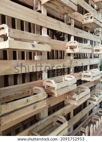 eye view of a unique flower rack, made of wood used for containers