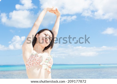 beautiful young girl on tropical island beach