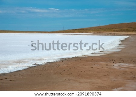 Salt lake in the steppes of Kalmykia, Russia Royalty-Free Stock Photo #2091890374