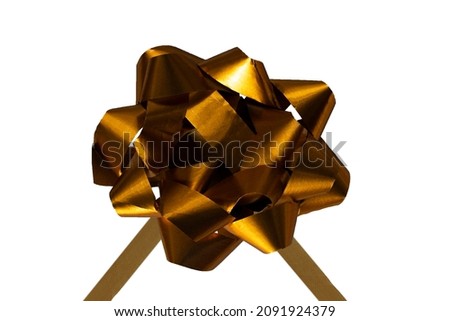 
Gold bow isolated on white background. Ribbon bow for a decorated gift. Ribbons isolated on white background. This is a decoration for a gift or a postcard. Gift and holiday concept.