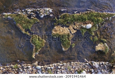 Map of the Earth which is made with rocks and sands and grass which contains all the continents exist on this planet Earth Royalty-Free Stock Photo #2091941464