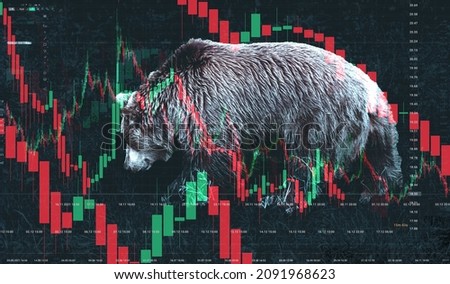 Stock market bear market. Downward trend charts on the investment platform. Double exposure of the bear and candles on the chart. Royalty-Free Stock Photo #2091968623