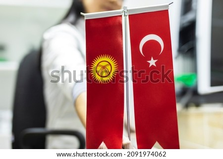 Expressing the friendship of Kyrgyzstan and Turkey with flags.