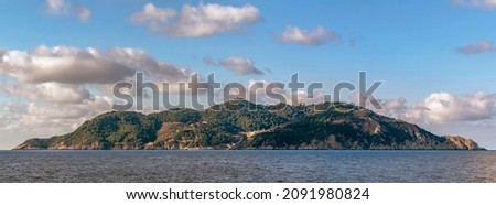 Panoramic view of the Island of Gorgona, Livorno, Italy, from the sea