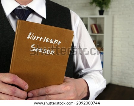 Financial concept about Hurricane Season with sign on the piece of paper.
