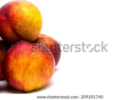 Peaches nectarines isolated on white background
