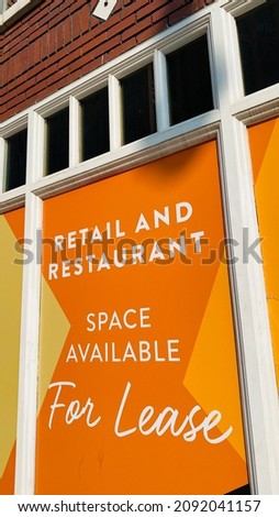 Retail and Restaurant Space Available For Lease Sign on Building Storefront