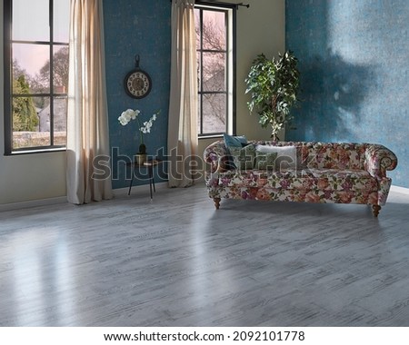 Flower pattern sofa in the blue wallpaper room, vase of green plant, clock and curtain, parquet floor modern room.