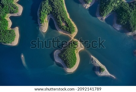 Aerial and top angle view of part of Crocodile Island at Chungjuho Lake in summer near Chungju-si, South Korea
