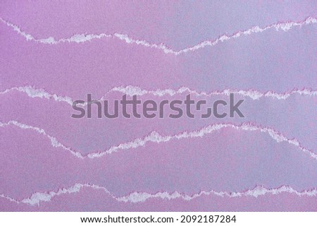 Abstract background. Layers of colored paper. Torn edges