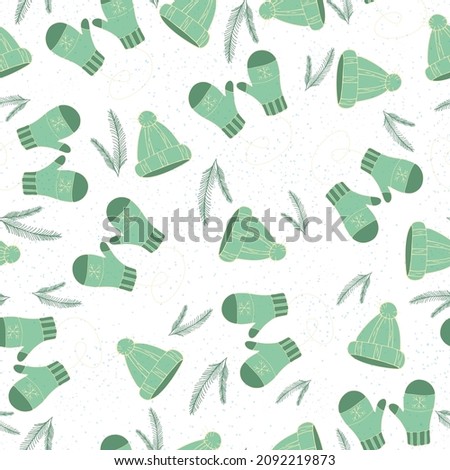 Vector hat mittens christmas tree branch on a white background seamless pattern.