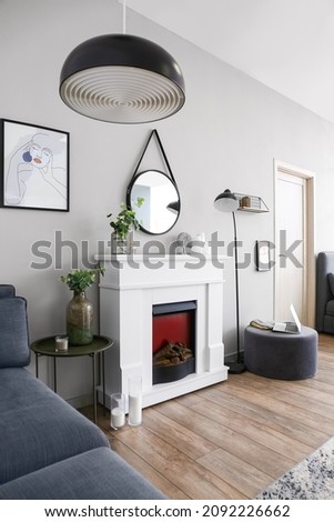 Modern fireplace in interior of living room