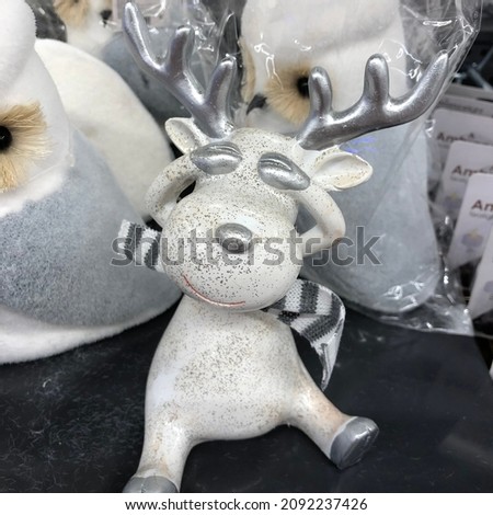 Macro photo New year deer toy. Stock photo holiday decor deer toy
