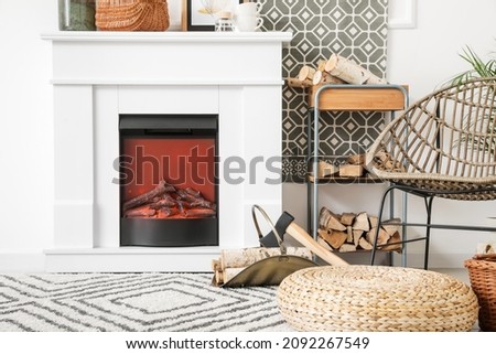 Interior of stylish living room with fireplace