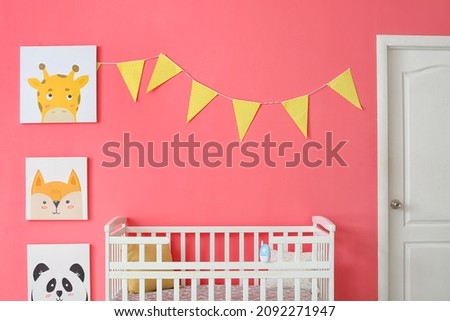 Interior of stylish children's room with comfortable bed