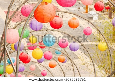 Colorful lanterns hanging outdoors in Asian festivals