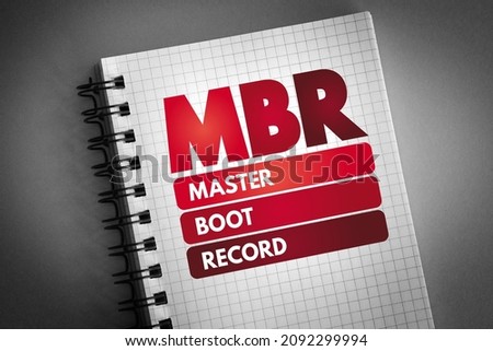 MBR Master Boot Record - information in the first sector of any hard disk that identifies how and where an operating system, acronym text concept on notepad