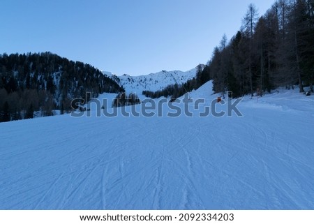 Ski resorts and ski slopes of the dolomiti superski area in the italian alps, snowy landscape during the winter season