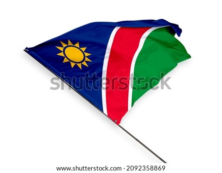 Namibia's flag is isolated on a white background. flag symbols of Namibia. close up of a Namibian flag waving in the wind.