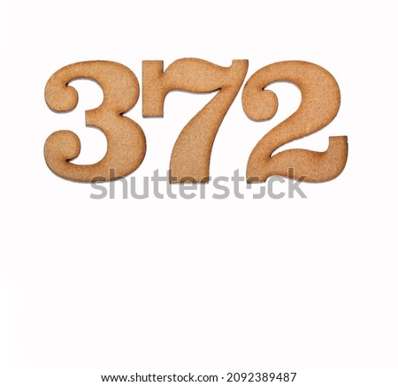 Number 372 in wood, isolated on white background