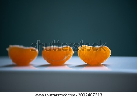 tangerines on a dark background. new year 2022. 
Holiday