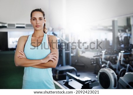 Portrait of an attractive young woman at the gym