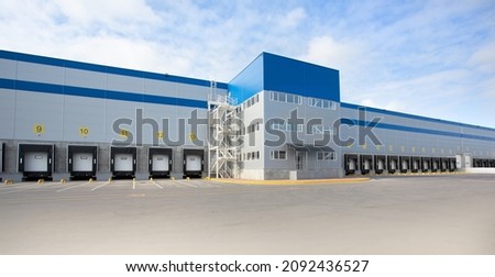 Building of a Huge distribution warehouse Royalty-Free Stock Photo #2092436527